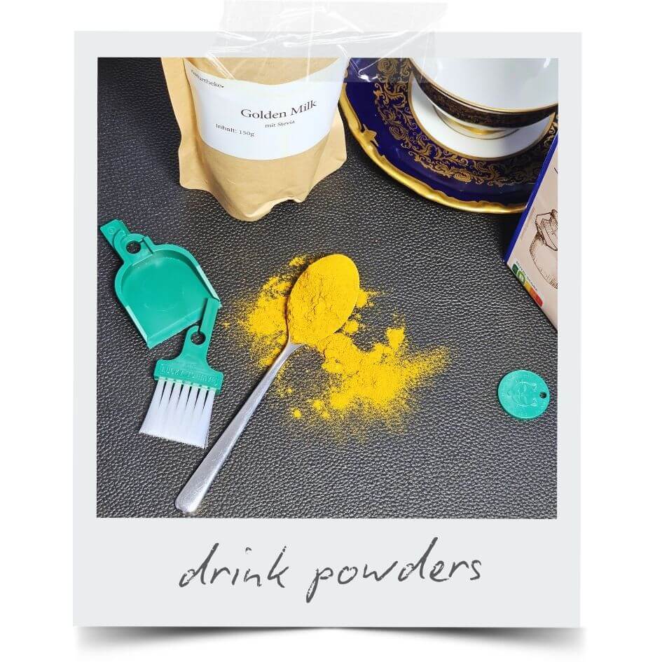 LUCKY TO HAVE® – the smallest broom and pan set in the world – sweeping spilled drink powders like Golden Milk with clean precision, perfect for handling fine supplement powders and kitchen crumbs without waste.