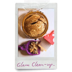 LUCKY TO HAVE® Lucky Mix mini dustpan and broom collecting broken makeup powder from a compact, enabling precise cleanup of cosmetic residue during glam clean-up - fine things matter.