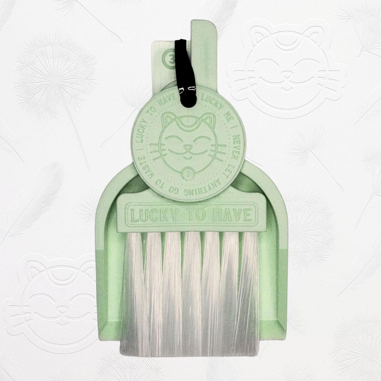 LUCKY TO HAVE® baby mint mini sweeper set presented in front of the signature brand-style wallpaper.