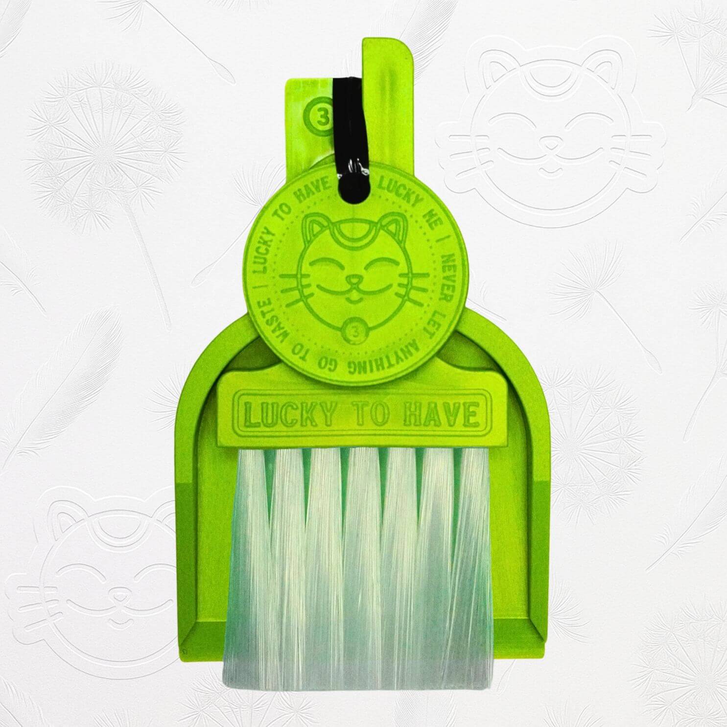 LUCKY TO HAVE® neon green mini dustpan set presented in front of the signature brand-style wallpaper.