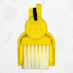 LUCKY TO HAVE® yellow mini dustpan set presented in front of the signature brand-style wallpaper.