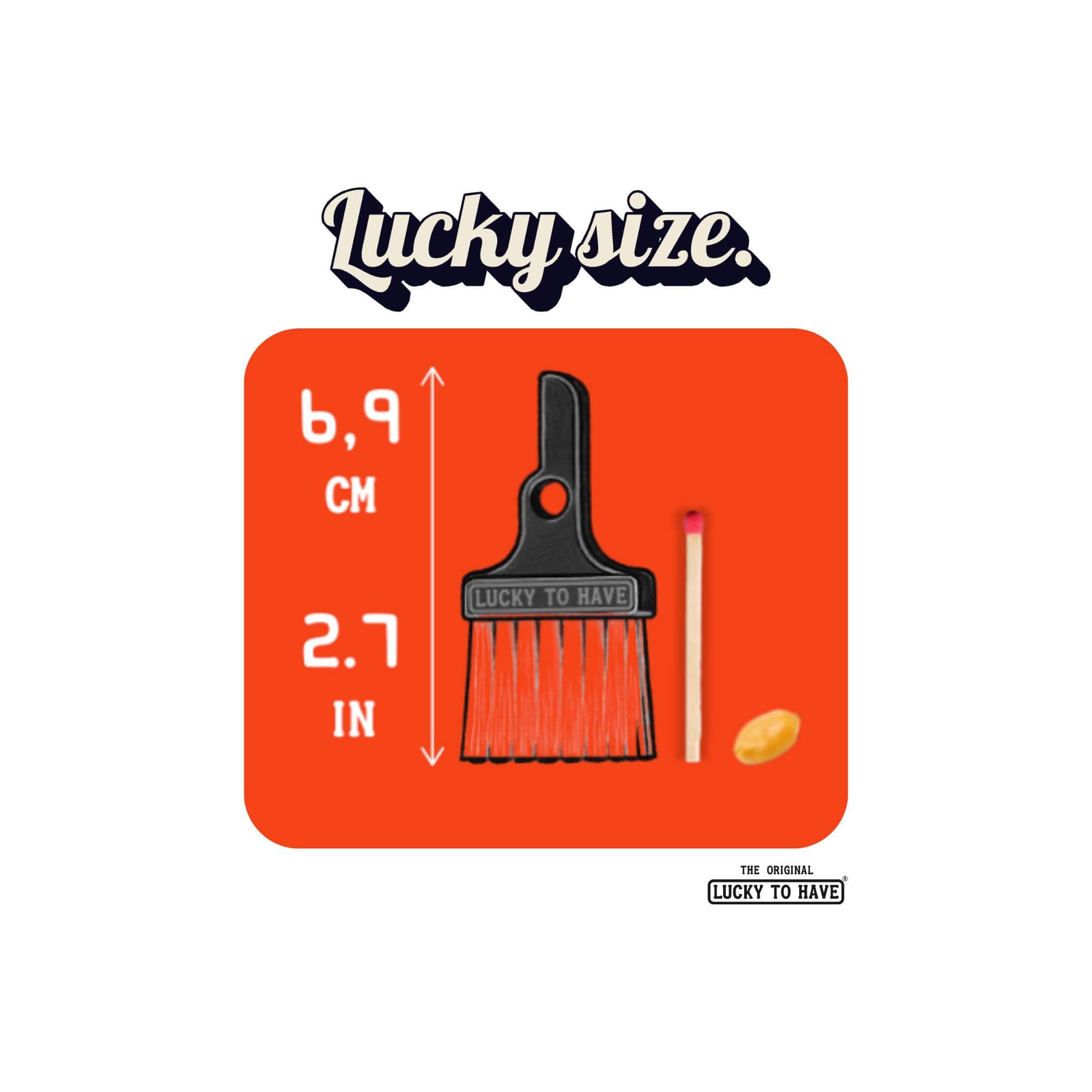 Size comparison of the LUCKY TO HAVE® broom: Only 6.9 cm (2.7 inches) long, similar in size to a matchstick or peanut – Lucky Size.