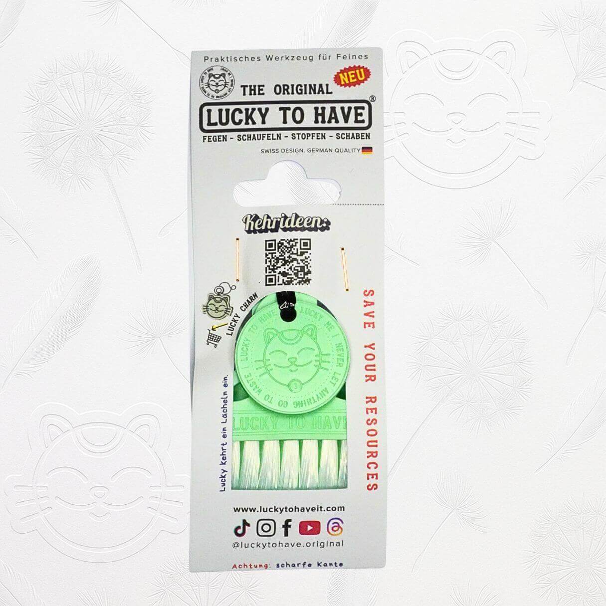 Sustainable paper packaging of the LUCKY TO HAVE® Lucky Boy set with display window, logo, QR code and #saveyourresources slogan.