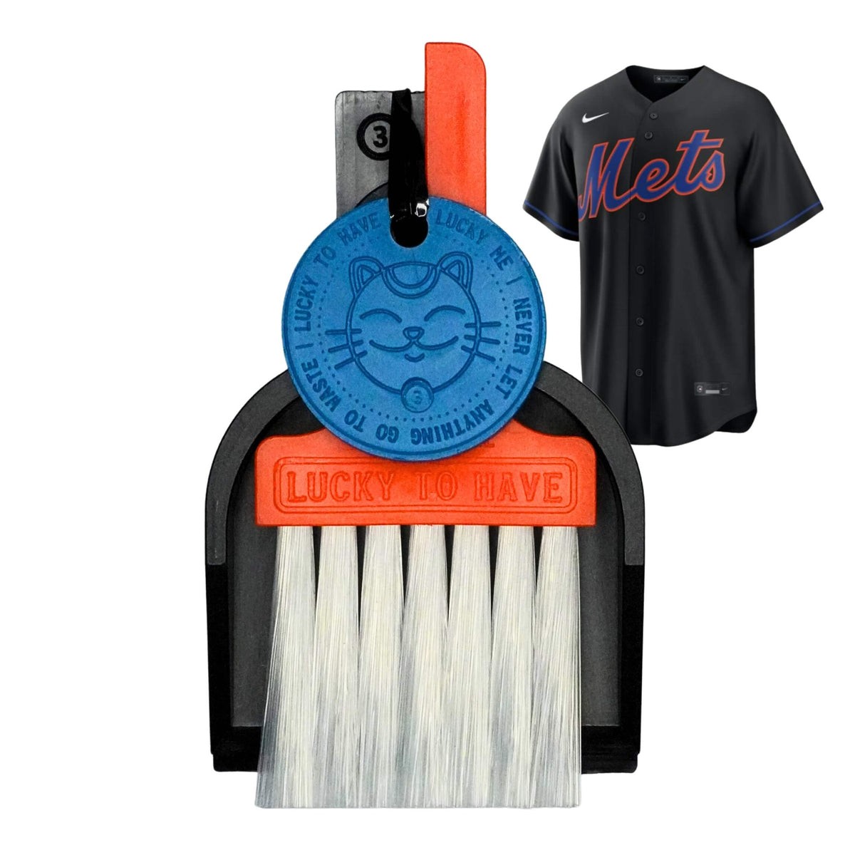 Custom Lucky by LUCKY TO HAVE® with an orange broom, black pan and blue Lucky Coin, inspired by the New York Mets’ team colours, shown beside a black Mets jersey.